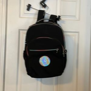 NWOT KIPLING  backpack ,black with rainbow zippers and lots of pockets.